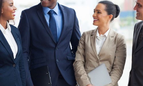 group of business people group of business people chatting after the meeting